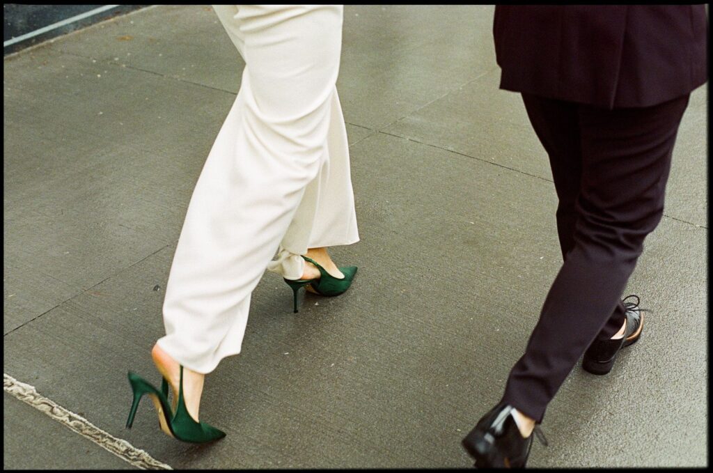 Wedding couple walking through Brooklyn, NY.