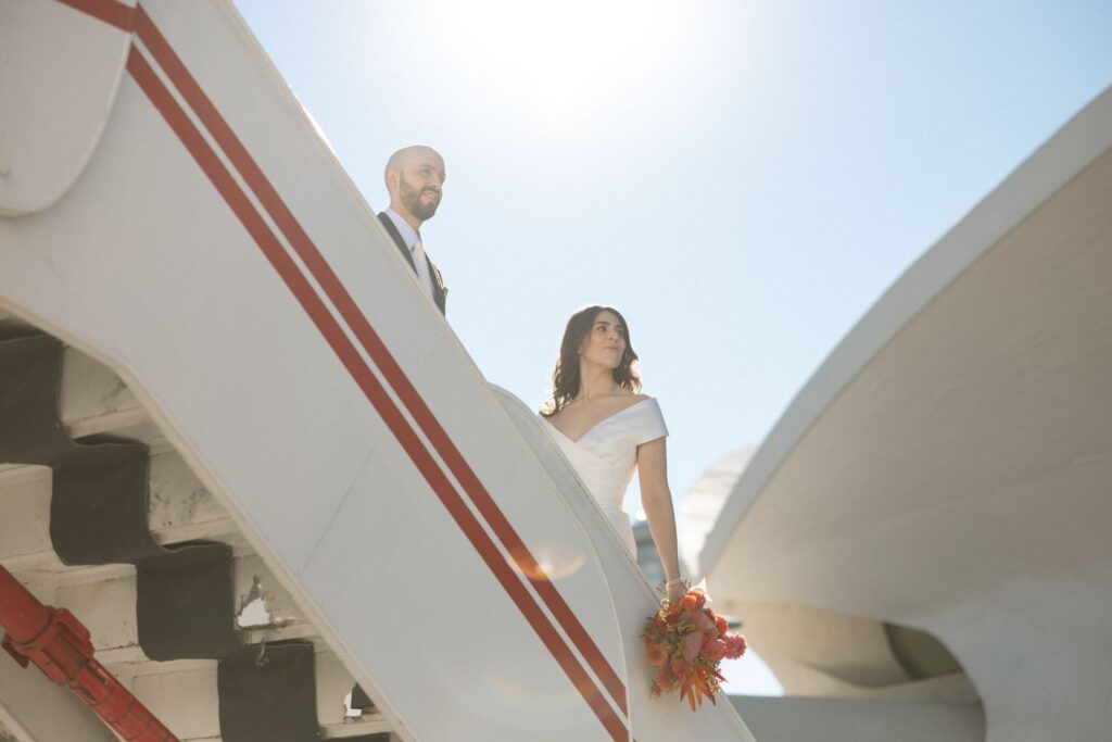 Bride and groom at TWA Hotel wedding, photographed by NYC photographer, Daniel Silbert.