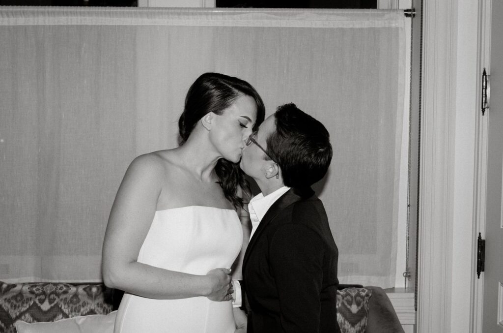 Queer wedding couple kissing, captured by New York City wedding photographer, Daniel Silbert.